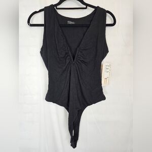 Naked Wardrobe sleeveless size 1X black low-cut V-neck bodysuit NWT